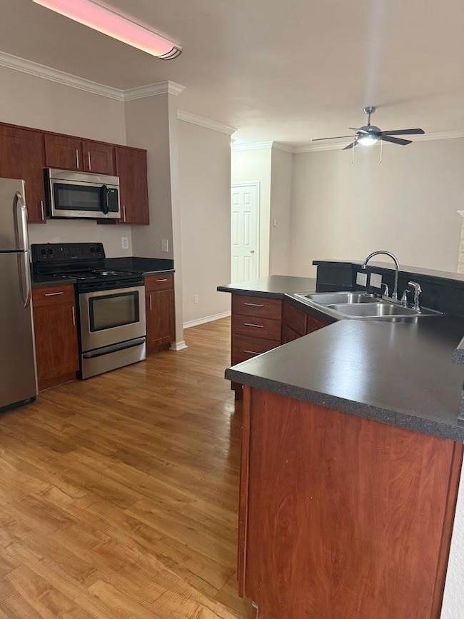 Kitchen featuring appliances with stainless steel