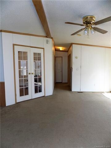 Split plan with master on one side and back bedrooms on other