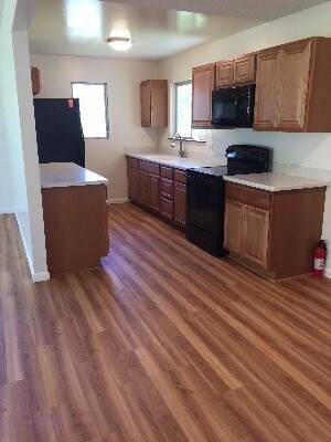 New kitchen with solid surface counter tops.