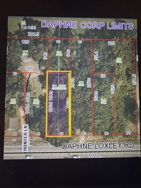Aerial map of property and surrounding area featuring property parcel outlined