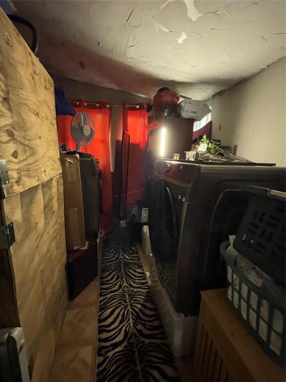 Clothes washing area with washer / clothes dryer