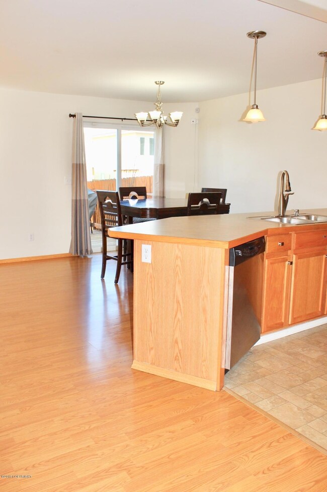 Open layout with laminate wood floors