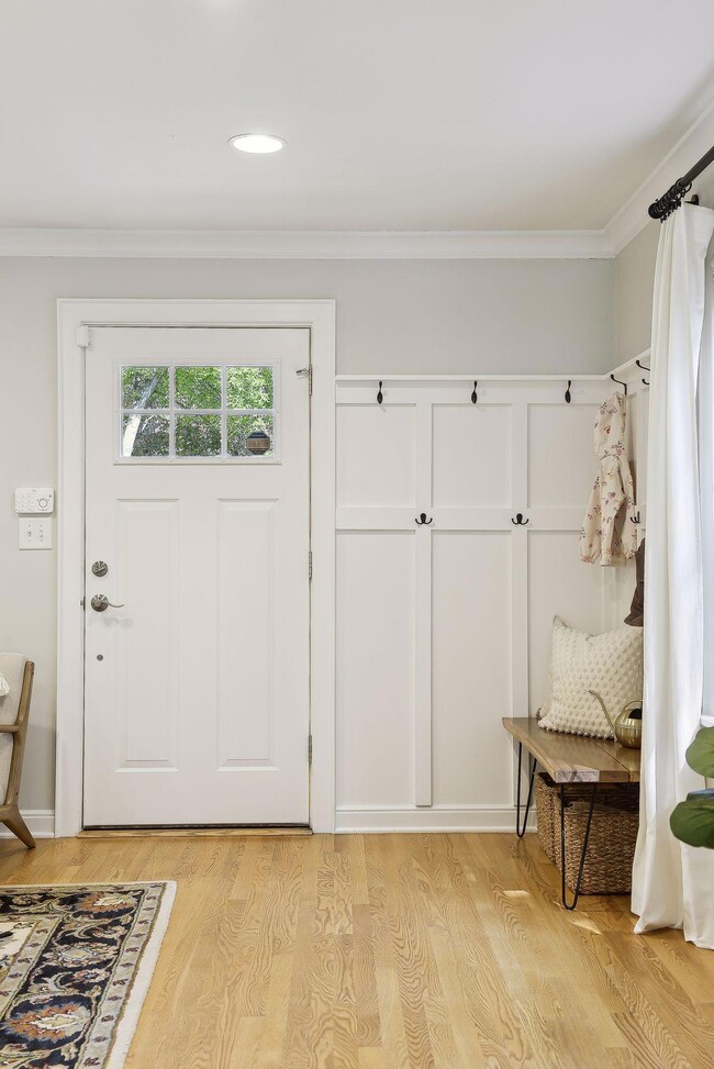 Stunning hardwood floors and detailed design throughout