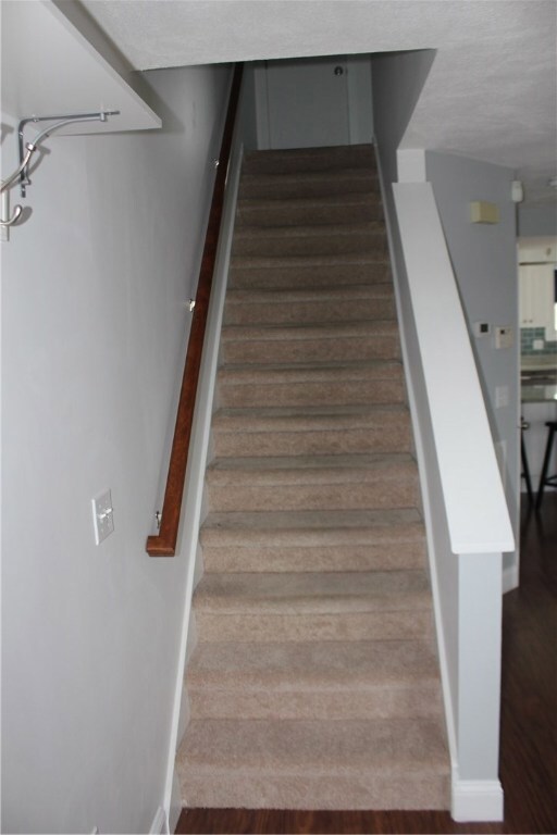 Staircase leading to bedrooms