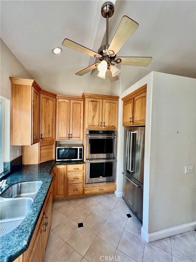 Granite counters, stainless steel appliances, double oven and REFRIGERATOR IS INCLUDED!