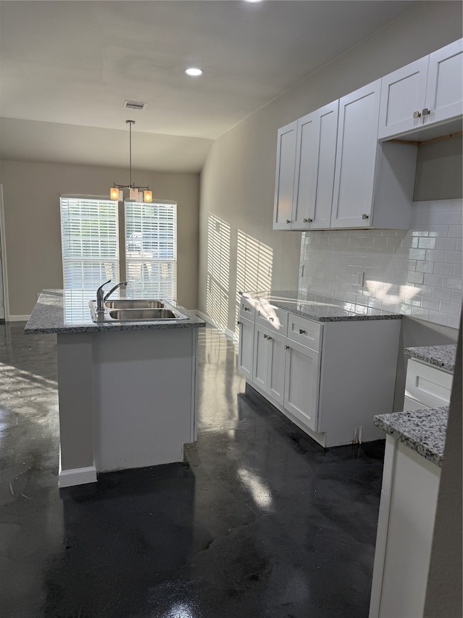 Kitchen w/ island
