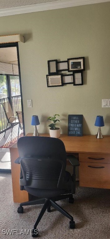 Carpeted office space featuring ornamental molding