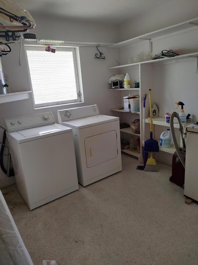 huge roo off kitchen with access to garage and bac