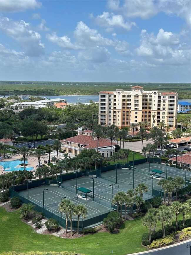 Minorca top floor condo overlooks river & steps to clubhouse, pool & tennis courts.