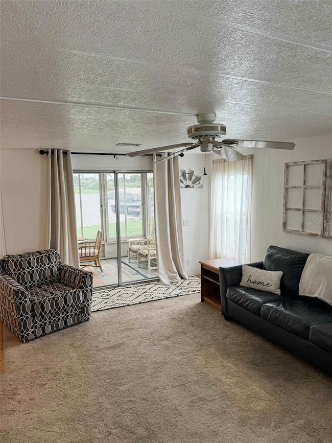 Family room walks out to fully enclosed Florida room that could easily convert to living space with the new HVAC system, which could easily accommodate the extra space