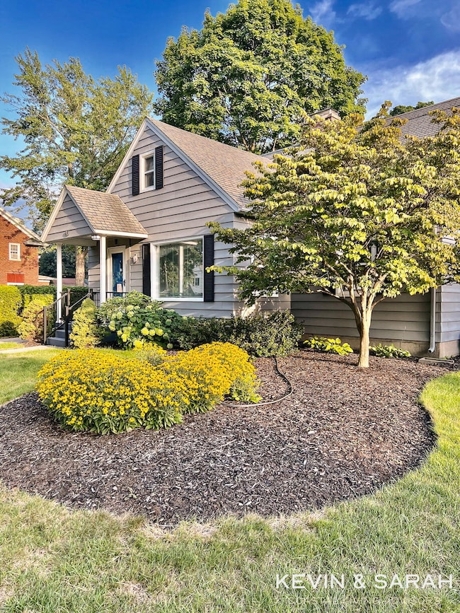 View of Front with shrubs in bloom