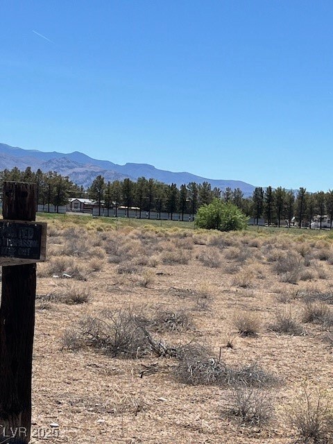 View of mountain backdrop featuring rural landscap