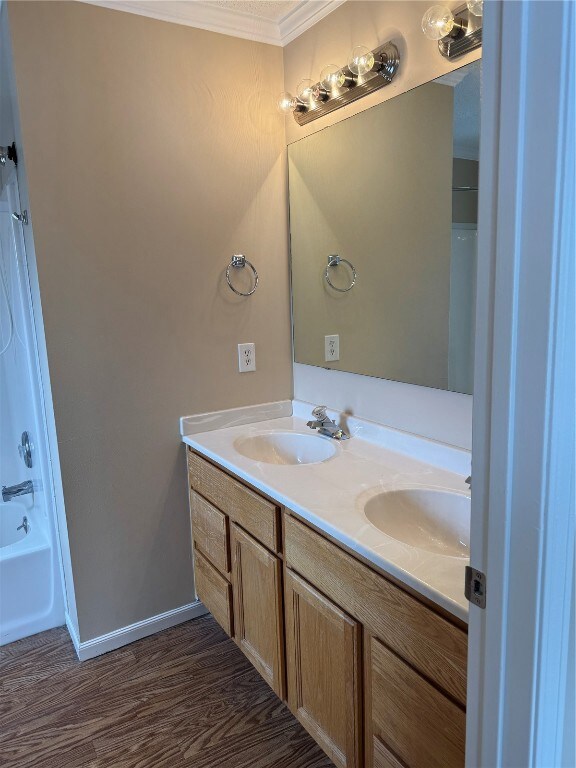 Bathroom featuring hardwood / wood-style flooring,