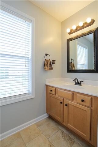 Shared Bathroom upstairs between bedroom 2 and 3.  New Neutral Paint. 