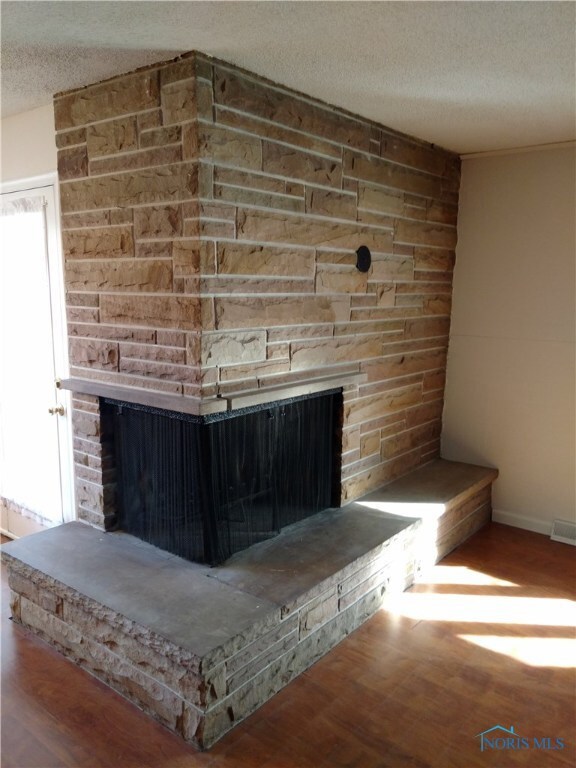 Massive Masonry Fireplace.