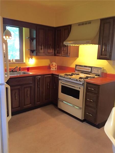 A brand new gas range is currently being installed