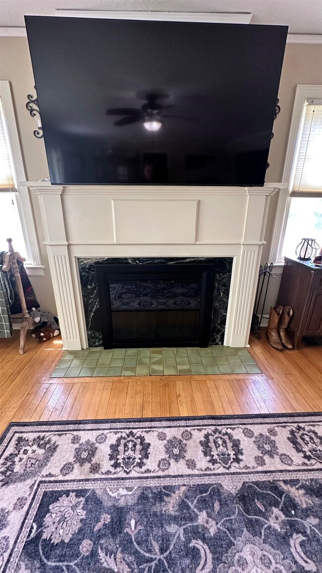 Wood burning fireplace with gas starter. the mante