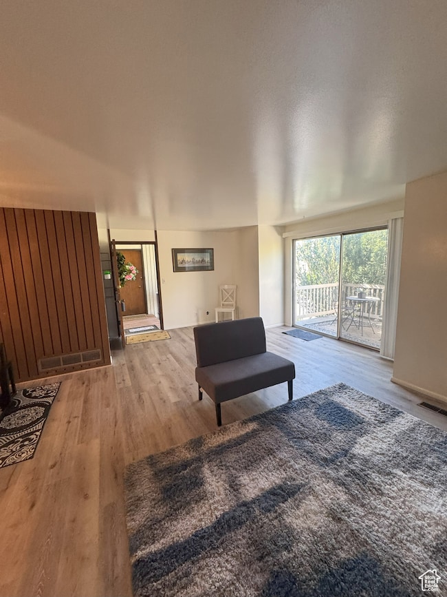 Living area with wood finished floors