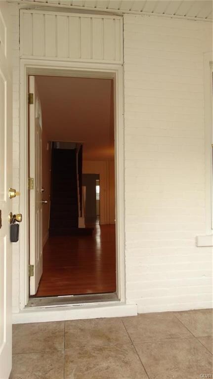 Enter into Enclosed Front Porch (heated)