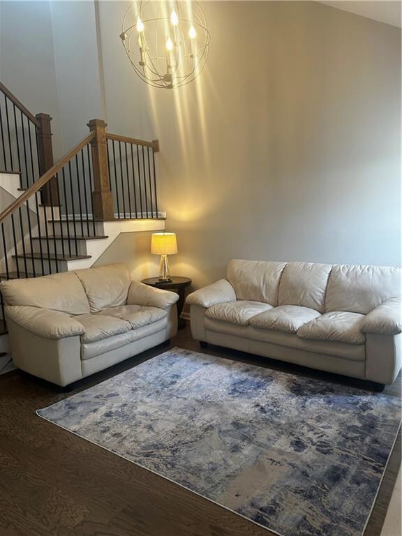 Two-story soaring ceilings in living room with ton