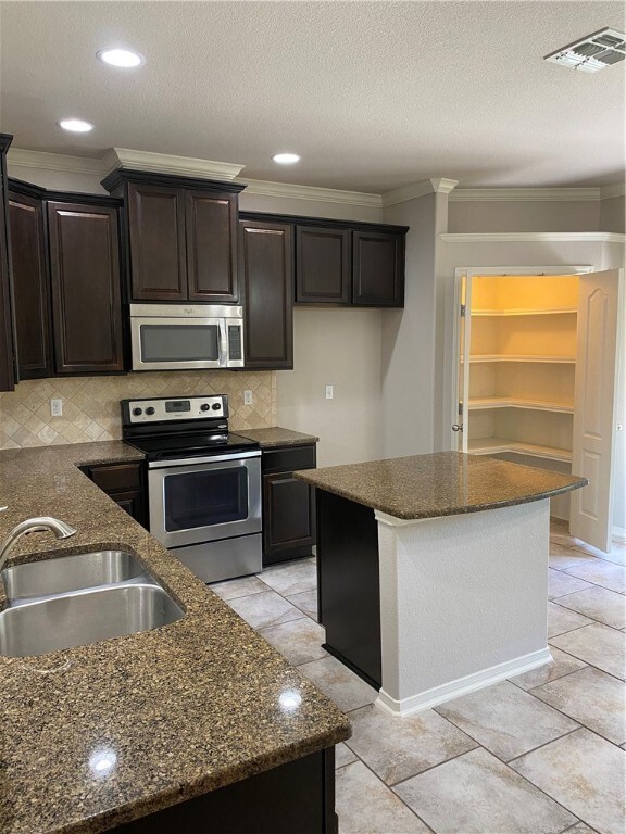 Stainless appliances in the kitchen