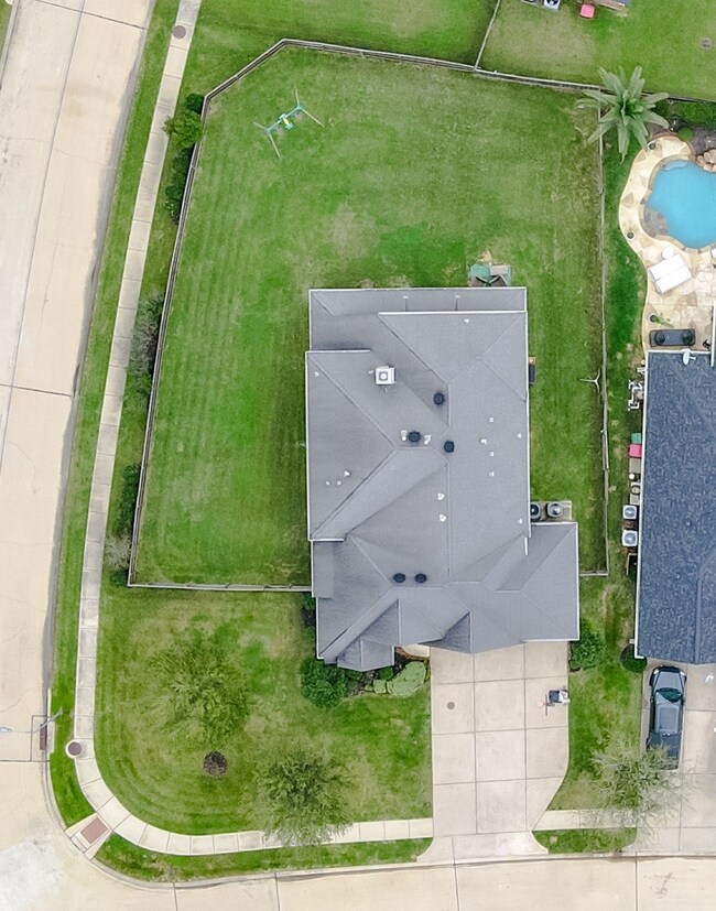 This gorgeous Highland Home is located on a premium .301 acre corner lot, steps away from one of many area parks/playgrounds.