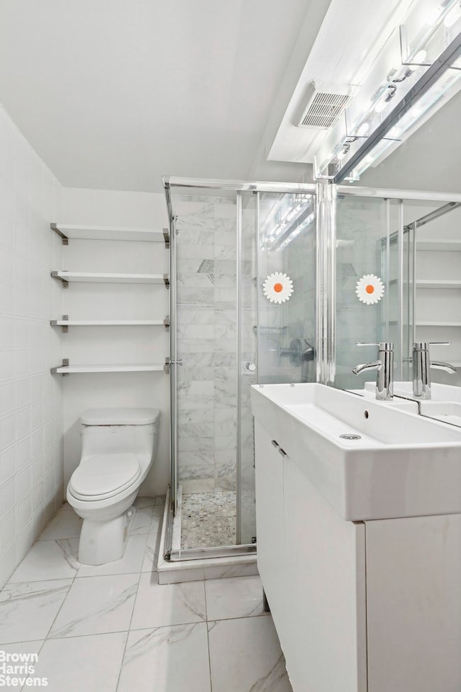 18 E 63rd St unit 1, New York, NY 10065 - photo 7