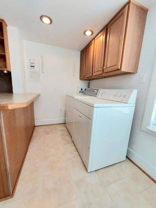 Utility, tankless water heater - House