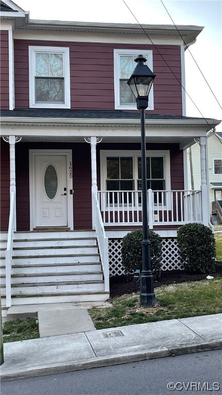 View of front of property with a porch