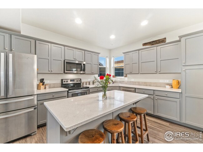 Pottery Barn Design - Painted Grey Cabinets and SS appliances