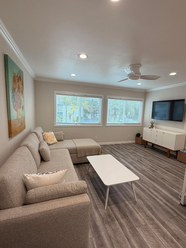 Living Room, custom queen sofa sleeper with extra long lounge & storage.