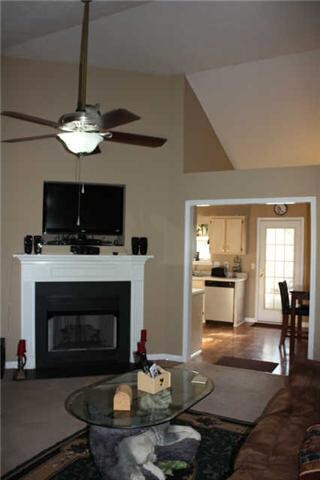 Living room has a vaulted ceiling 