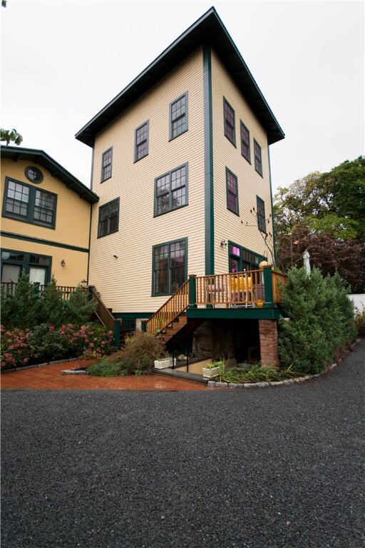 Exterior rear view of unit and deck.