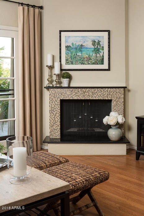 Fireplace with mosaic tile surround