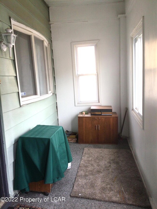 Enclosed front porch