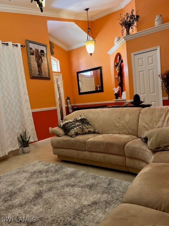 Tiled living area with ornamental molding and base