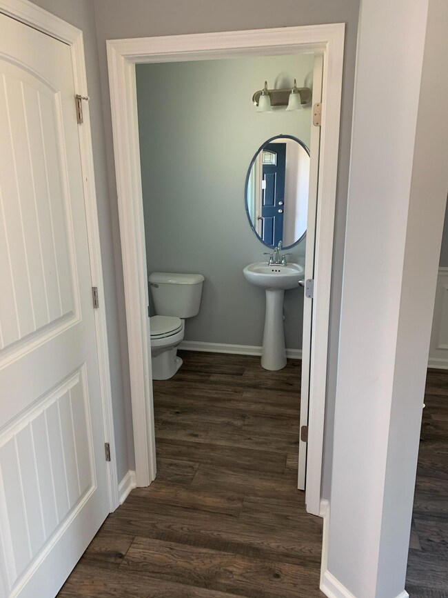 Powder Room w/ laminate flooring
