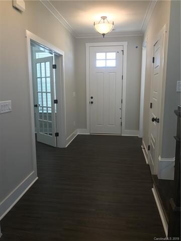 Foyer with French doors leading to Study