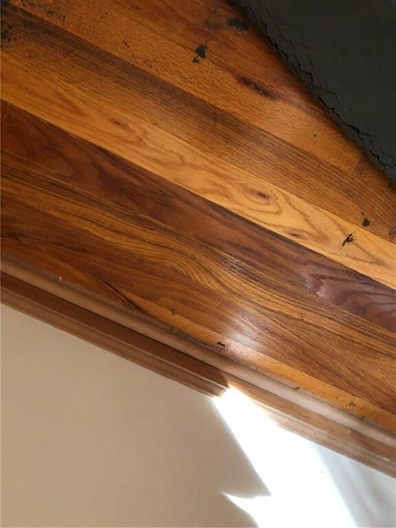 This is a photo of the hardwood floors under the c