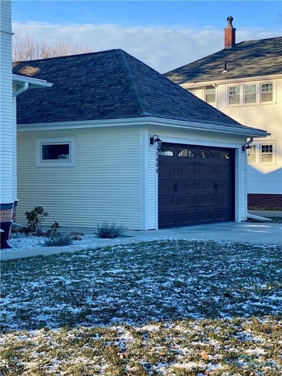Garage designed and built to match the style of th