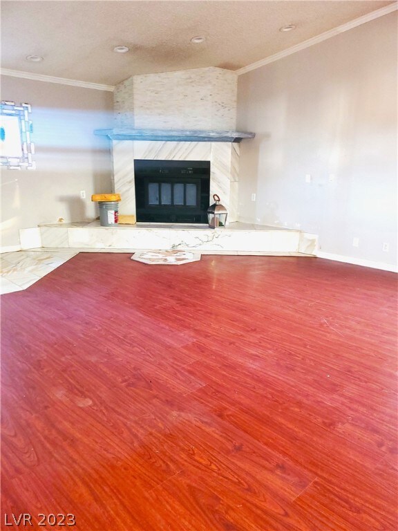 Wood burning fireplace with tile and stone surroun