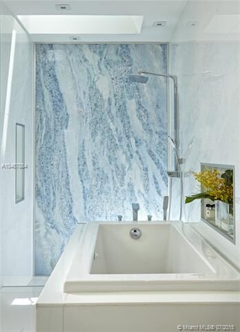 Extravagant Italian Blue marble in MBR Suite. Easy