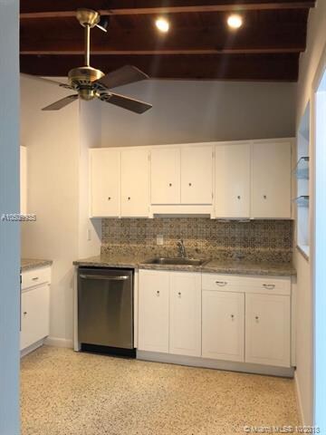 Kitchen with wood ceilings and fan