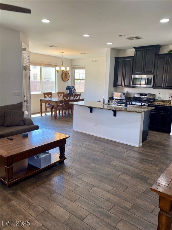 From Living Room to Gourmet Kitchen with dark cera