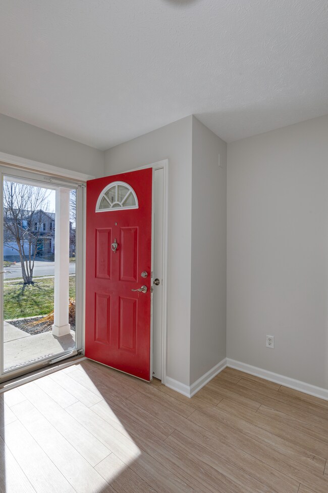 FRONT ENTRY:  New Flooring and Fresh paint welcomes you inside.