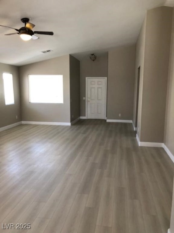 Living room featuring vinyl plank flooring, 4/1/2