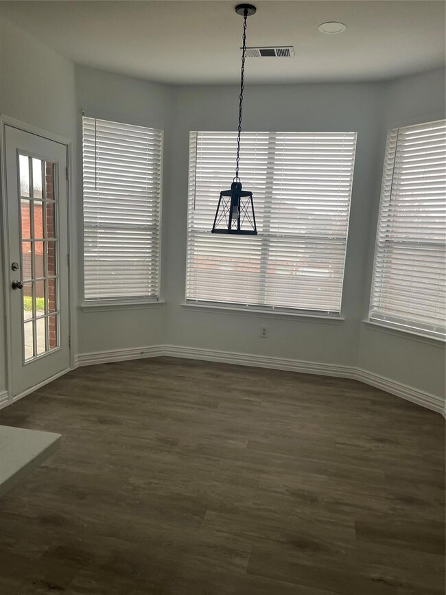 Dining area featuring dark hardwood / wood-style floors