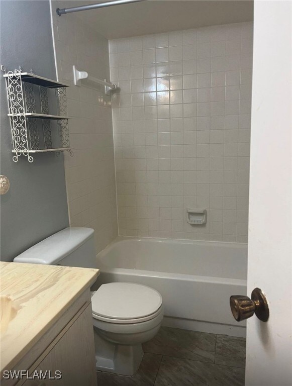 Full bath featuring vanity, bathtub / shower combi