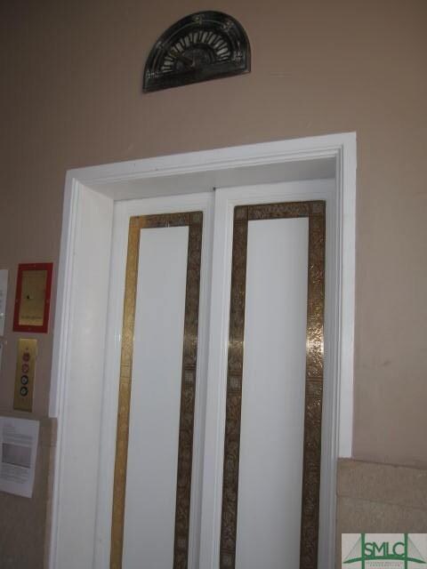 Charming elevator takes you to your top floor dest