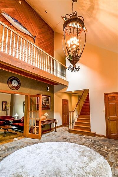From the foyer doors to the right is the garage, s